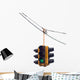 Green traffic light hanging from a cable, isolated on white. Wall Decal
