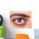 Irritated red bloodshot eye Wall Mural