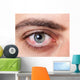 Irritated red bloodshot eye Wall Mural