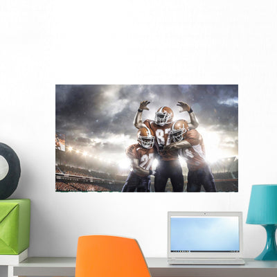 American Football Players Action Wall Mural shown on a wall
