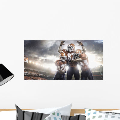 American Football Players Action shown on a wall