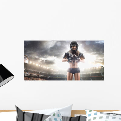 American Football Female Player Wall Mural shown on a wall