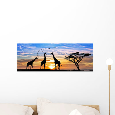 Safari Por El Atardecer Wall Mural Panoramic shown on a wall