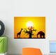 Elephant and giraffe with a baobab at sunset Wall Mural
