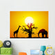 Elephant and giraffe with a baobab at sunset Wall Mural