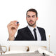 Focused businessman writing with marker Wall Decal