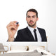 Focused businessman writing with marker Wall Decal