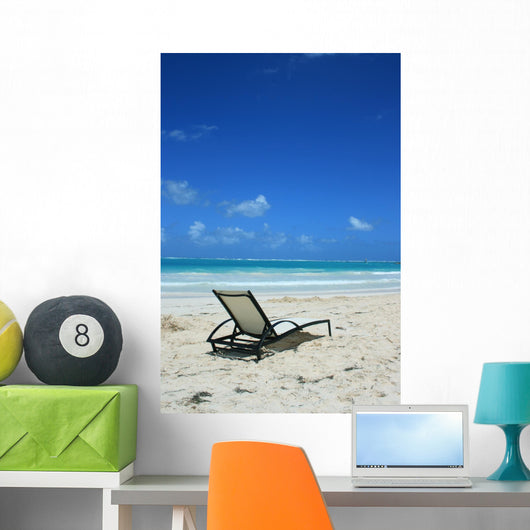 Deckchair on the beach Wall Mural