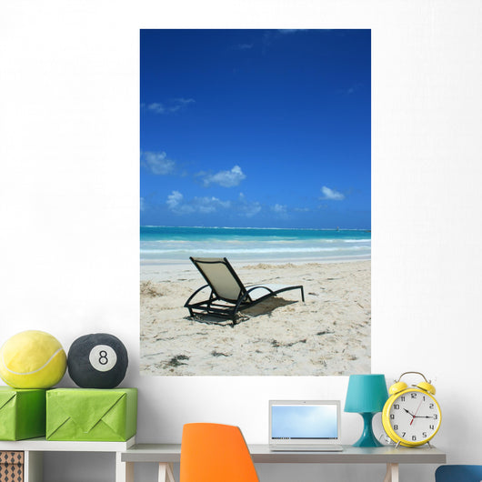 Deckchair on the beach Wall Mural