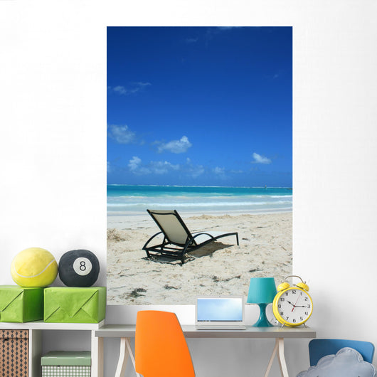 Deckchair on the beach Wall Mural