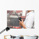 Man using walkie talkie Wall Mural