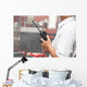 Man using walkie talkie Wall Mural