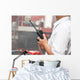 Man using walkie talkie Wall Mural
