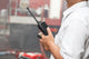 Man using walkie talkie Wall Mural