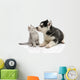 Cute puppy kissing kitten Wall Decal