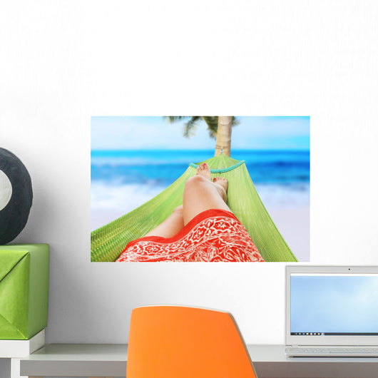girl enjoying on the beach Wall Mural