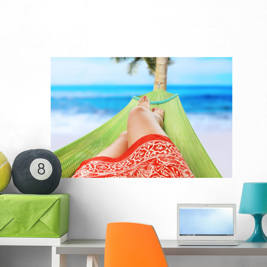 girl enjoying on the beach Wall Mural