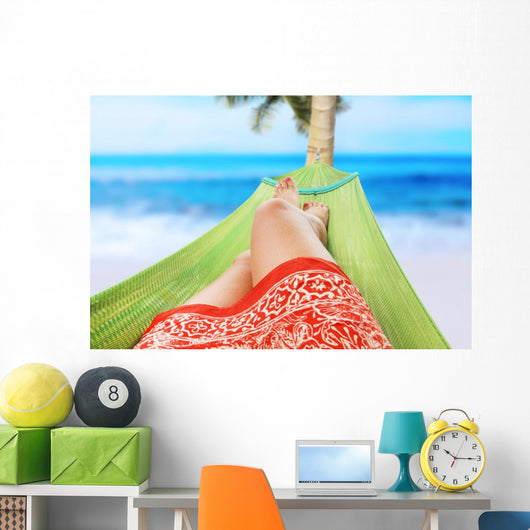 girl enjoying on the beach Wall Mural