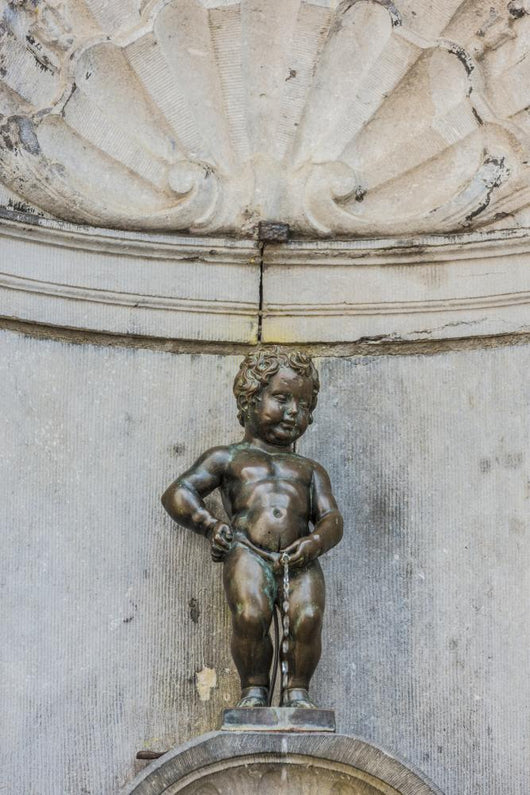 Manneken Pis sculpture in Brussels, Belgium Wall Mural