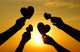 hands holding hearts silhouette Wall Mural