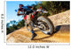 Motocross bike taking off on dirt road. Wall Mural
