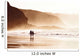 couple walking on beach with fog Wall Mural