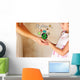 photo of mother and child holding hands and showing a better wor Wall Mural