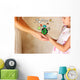 photo of mother and child holding hands and showing a better wor Wall Mural
