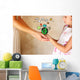 photo of mother and child holding hands and showing a better wor Wall Mural