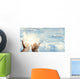 Hands in sky Wall Mural