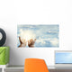 Hands in sky Wall Mural