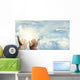 Hands in sky Wall Mural