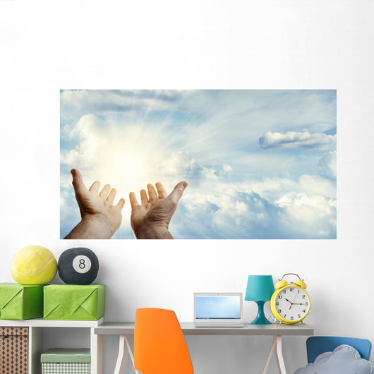 Hands in sky Wall Mural