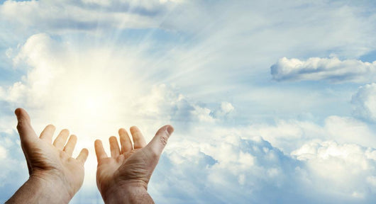 Hands in sky Wall Mural