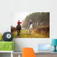 Young woman riding a horse Wall Mural