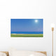 Beautiful summer view of a golf course. background of the sea. Wall Mural