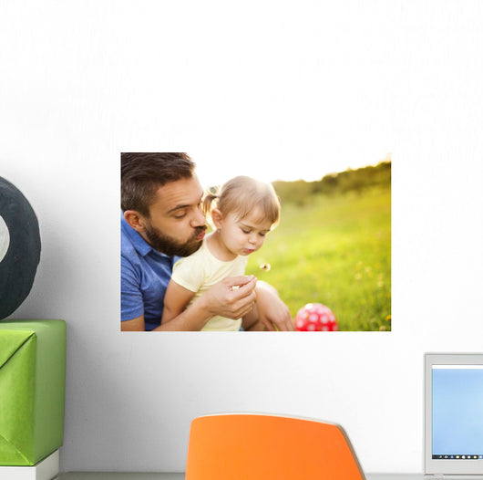 Father and daughter playing Wall Mural