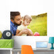 Father and daughter playing Wall Mural