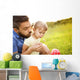 Father and daughter playing Wall Mural