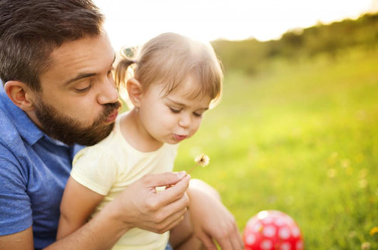 Father and daughter playing Wall Mural
