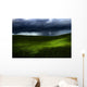 Green land over a storm Wall Mural