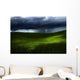 Green land over a storm Wall Mural
