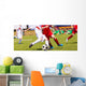 Football match for children. Boys playing football tournament Wall Mural