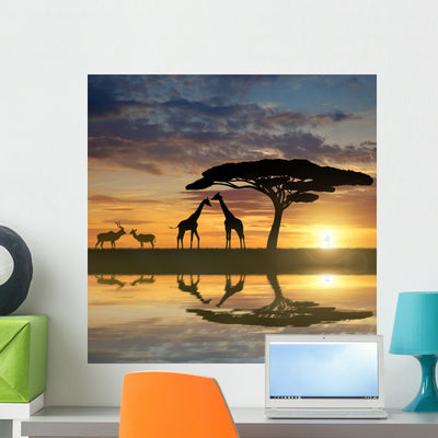 Giraffes with Kudu Sunset Wall Mural shown on a wall