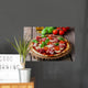 pizza with mozzarella and prosciutto, tomatoes Wall Mural
