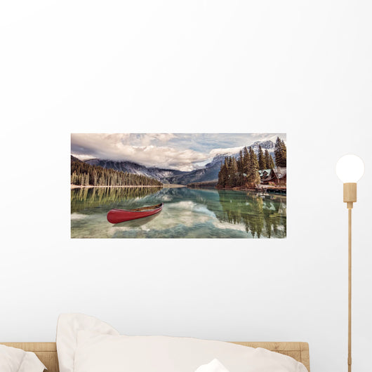 Red canoe on Emerald Lake Wall Mural