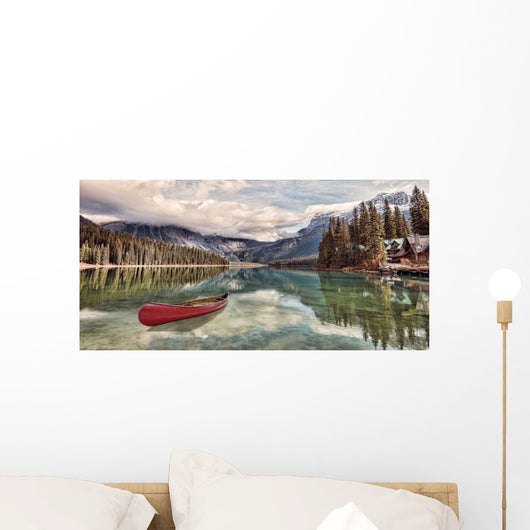 Red canoe on Emerald Lake Wall Mural