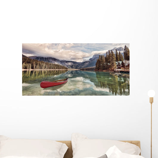 Red canoe on Emerald Lake Wall Mural