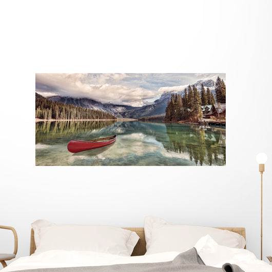 Red canoe on Emerald Lake Wall Mural