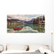 Red canoe on Emerald Lake Wall Mural